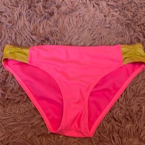 I'm selling a bathing suit. front of the top it says mermaid squad. NEVER WORN